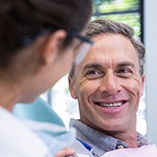 man talking to his dentist 