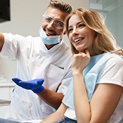 dental patient seeing her new smile 