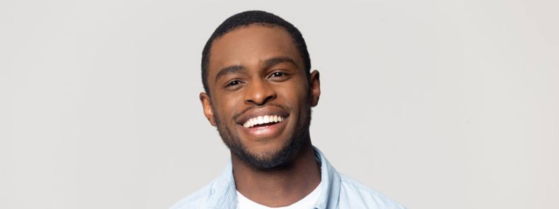 Patient in Chula Vista smiling after dental bridge restoration