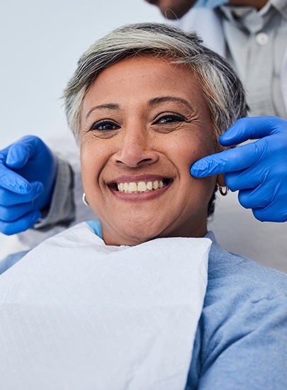 Patient in Chula Vista smiling confidently after dental bridge placement