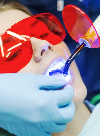 Woman receiving cosmetic dental bonding