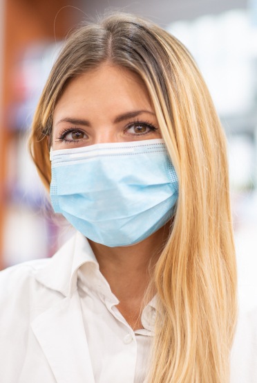 Dental team member wearing a face mask