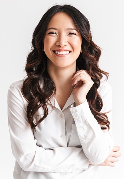 Woman with gorgeous smile in white shirt