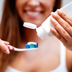 Woman brushing her teeth