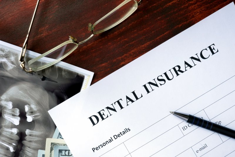 dental insurance form on table