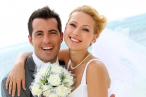 smiling bride and groom